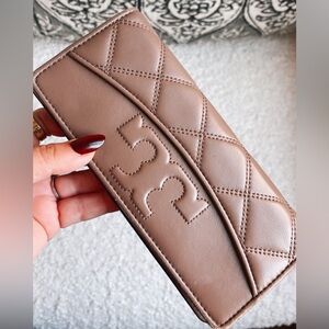Tory Burch taupe slim wallet.